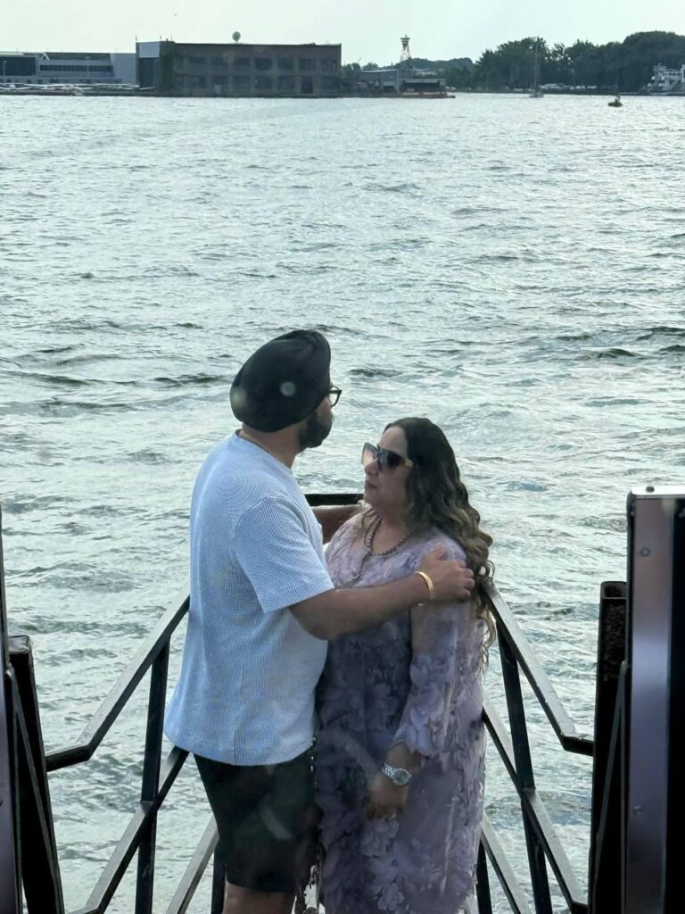 Couple looking across Lake Ontario