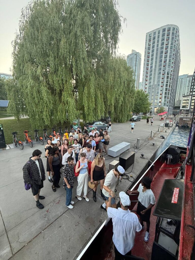 Guests walking toward the yacht
